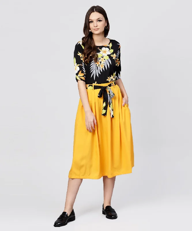 NOZ2TOZ Black Printed Half Sleeve Tops With Yellow Calf Length Skirt With Belt relaxed fit skirt